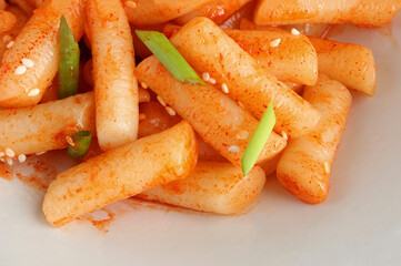 Closeup of Tteokbokki or korean spicy rice cake in korean spicy sauce. Korean food style,Top view.