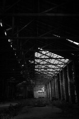 Old abandoned industrial building interior 