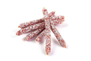 Cured salami sticks, isolated on white background.