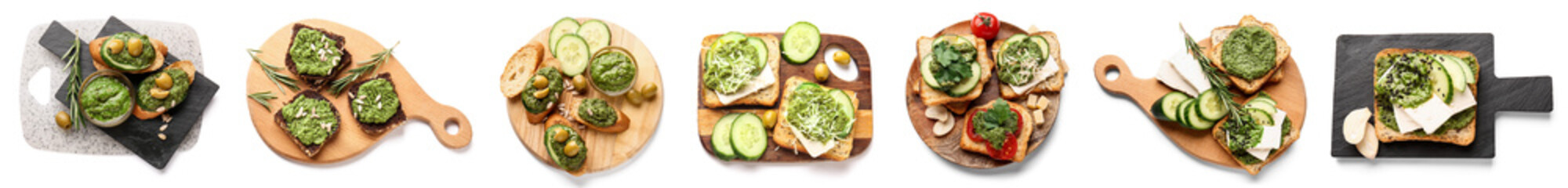 Tasty toasts with pesto sauce and olives on white background