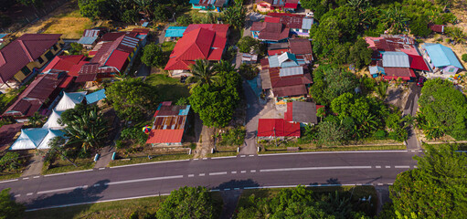 Aerial drone view of houses from top view which is located in Chabau, Melaka, Malaysia.
