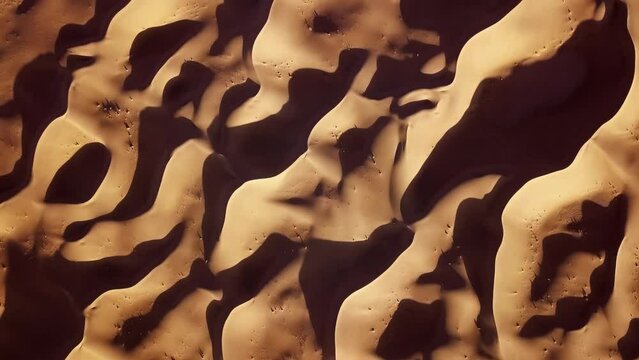 Aerial top view on sand dunes in Sahara desert, Africa, 4k