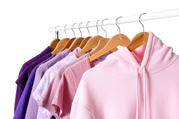 Rack with female clothes on white background, closeup