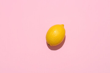 Ripe lemon on pink background, top view - Powered by Adobe
