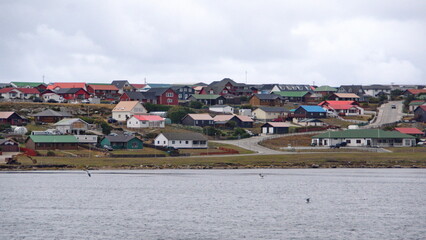 Fototapeta na wymiar Town of Stanley, Falkland Islands on the hill above the harbor