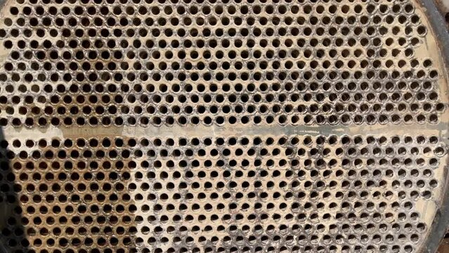 Shell-and-tube (shell-and-tube) heat exchanger for heat exchange between two streams close-up. Heat exchanger tubes in the open