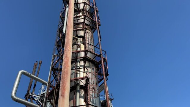 The main distillation column of oil and petroleum products in close-up