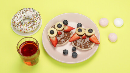 Pancakes for kids on colourfull background.