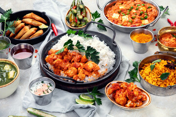 Indian food assortment on light background.
