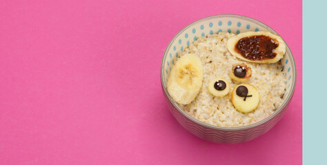 Different oatmeal for kids on colourfull background.