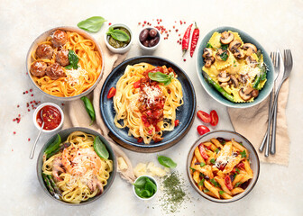 Italian pasta assortment on light background.
