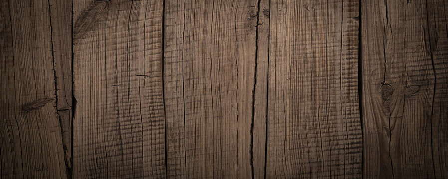 Vintage wooden barn plank texture background in the dark