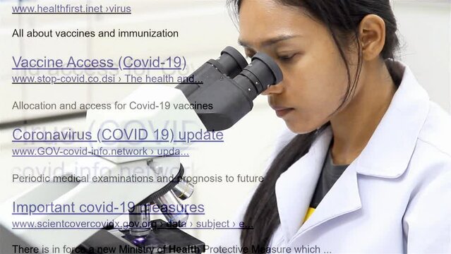 The links of imaginary no-existing websites rolls beside a doctor working with a microscope in a laboratory.