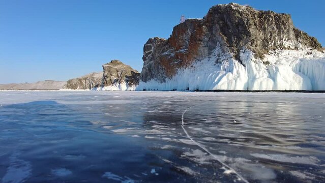 Frozen Lake Baikal, Olkhon Island, Rock cape. Siberia, Russia, 4k