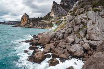 Coastal seascape landscape with Mount Cat or Koshka from rock Diva on cloudy weather. Simeiz, Crimea