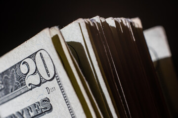 stack of twenty dollars banknotes, close up, front side