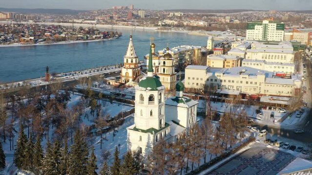 Aerial around view of the Spasskaya Church of our saviour, the oldest brick-and-stone edifice in east Siberia, Irkutsk, Russia, 4k