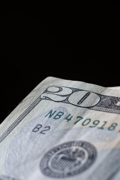 corner of banknote of stack of twenty dollars, close up, front side