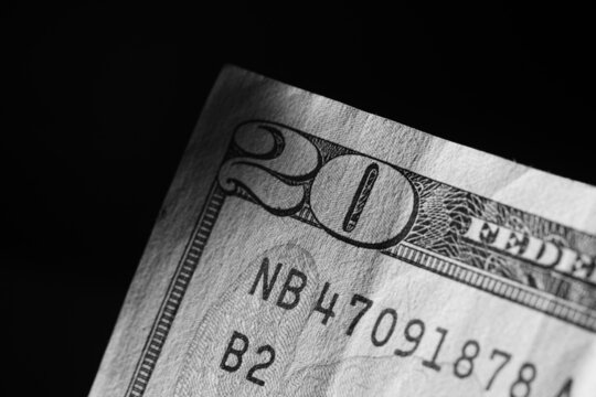 corner of banknote of stack of twenty dollars, close up, front side