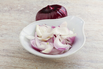 Sliced red onion in the bowl
