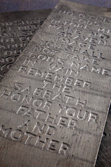 Ten Commandments Carved into Two Black Stones