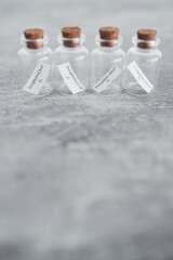 natural beauty and organic ingredients in skincare, small apothecary style bottles with ingredients labels