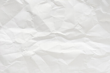 White crumpled paper texture background.