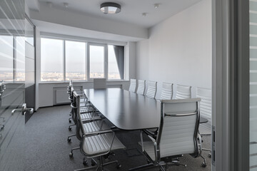 conference room, office space with large windows, modern bright office