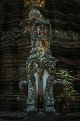 Mythological creatures statue at Wat Palad or Wat Pha Lat temple the secret hidden temples nestled in the jungle is the travel destination of Chiang Mai, Thailand.