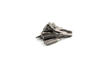 Isolated on a white background tips of a group of phillips head screwdriver bits. Top view.
