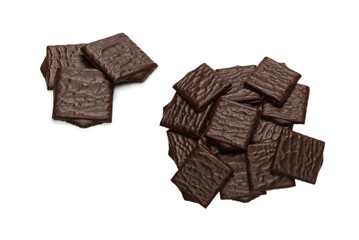 Dark chocolate candies isolated on white background.