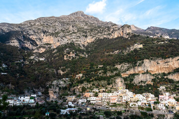 Fototapeta na wymiar Panoramic view from coastal town Positano on mountain peaks of Monte San Michele, Molare, Canino, Caldare in Lattari Mountains, Apennines, Amalfi Coast, Italy, Europe. Parts of upper Positano village