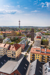 Aerial view towards the Ziębicka Gate Tower - a gothic defensive tower made of red brick.