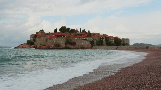 View of ancient city of San Stefan in Montenegro on Adriatic Sea. High quality FullHD footage