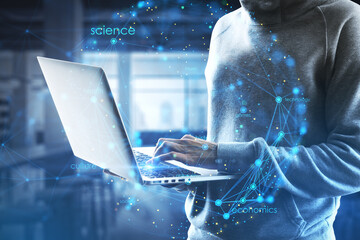 Close up of hands using laptop with ccreative digital linear sphere on blurry office interior background. Global network and communication concept. Double exposure.