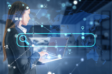 Attractive young european businessman using laptop with creative search bar and digital blue map...