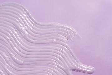 Deurstickers A smear of cream or face mask. The appearance of the texture of the cream on lilac background. Skincare products, natural cosmetic. Beauty concept for face and body care © Alex Shi