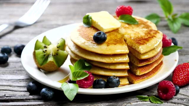 stack of pancakes with berries fruits