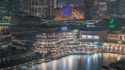 Dubai Fountain aerial night timelapse. Musical fountain, located in an artificial lake in downtown
