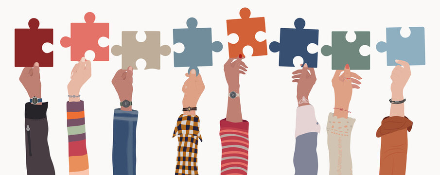 Human resources concept. Raised arms and hand up of multicultural business people holding a jigsaw puzzle piece. Job occupation and employment. Employee recruitment. Candidate