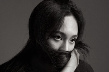 High fashion portrait of young elegant woman. Black and White image