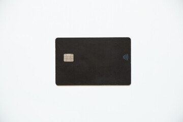 Banking black plastic card on a white background, finance