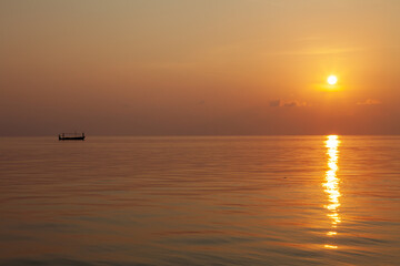 Fototapeta na wymiar Morning fishing boat in Maldives