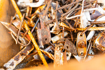 Rusty fittings of old wooden windows close-up. Sorted scrap metal