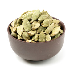 Green cardamom pods on white background