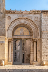 Fototapeta premium Entrance gate to Euphrasian Basilica complex in the streets of Porec - Croatia