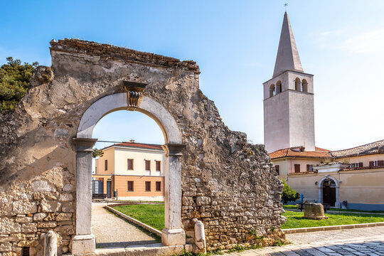 View at the Bell tower and Old Wall near Basilica of Saint Eufrazius in Porec, Croatia