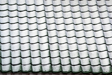 Snow covered rooftop. Roof tile texture. White pattern background