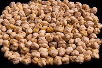 chickpeas (kadala) on black background