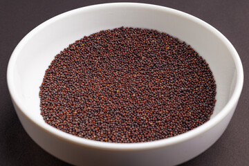 black mustards (kaduku) in a white bowl